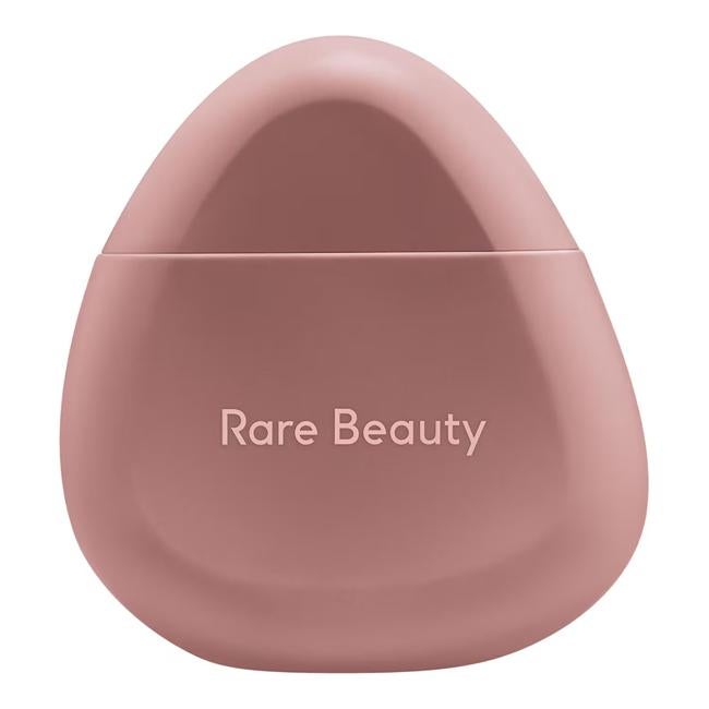 Belleza rara Encuentra la comodidad de la crema de manos hidratante.